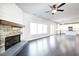Open-concept living space with hardwood floors and lots of light that flows into the modern kitchen at 2076 Greenridge Se Rd, Smyrna, GA 30080
