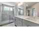 Modern bathroom with a glass shower, double sinks, and ample counter space at 333 Willow Cv, Canton, GA 30114