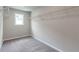 Walk-in closet with wire shelving and neutral carpeting at 333 Willow Cv, Canton, GA 30114