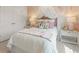Charming bedroom with a canopy bed, floral accents, and soft lighting at 5523 Rosehall Pl, Atlanta, GA 30349