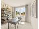 Bright office featuring a stylish desk, decorative shelving, and large windows that let in plenty of natural light at 5523 Rosehall Pl, Atlanta, GA 30349