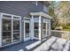 Back deck of a home featuring multiple windows and a door providing access to the outdoor living space at 1129 Gavinwood Pl, Decatur, GA 30033