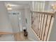 Light-filled foyer with hardwood floors and elegant staircase leading to a sunlit living area at 1129 Gavinwood Pl, Decatur, GA 30033