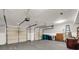 Spacious three-car garage with ample storage space and overhead doors, ready for vehicles and projects at 1129 Gavinwood Pl, Decatur, GA 30033
