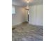 Unfinished basement with new flooring and access to the rest of the house at 1649 Ezra Church Nw Dr, Atlanta, GA 30314