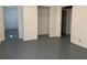 Unfinished basement with bare walls and concrete flooring and open doorways to additional spaces at 1649 Ezra Church Nw Dr, Atlanta, GA 30314