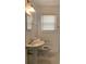 Clean bathroom with a pedestal sink and new faucet at 1649 Ezra Church Nw Dr, Atlanta, GA 30314