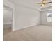 Large main bedroom boasts tray ceilings and an ensuite bathroom at 2761 Honey Locust, Loganville, GA 30052