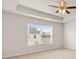 Comfortable main bedroom features a window and a ceiling fan at 2761 Honey Locust, Loganville, GA 30052