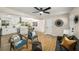 Cozy living space with modern furnishings and an open layout connecting to the stylish and updated kitchen at 465 Hurt Se Rd, Smyrna, GA 30082