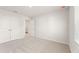 Comfortable bedroom with soft carpet, walk-in closet, and well-lit interiors at 5527 Rosehall Pl, Atlanta, GA 30349