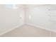 This walk-in closet features carpet flooring and wire shelving at 5527 Rosehall Pl, Atlanta, GA 30349