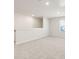 A spacious open loft offers versatile living space with abundant natural light at 5527 Rosehall Pl, Atlanta, GA 30349