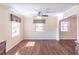 Charming dining area with hardwood floors and natural light from two windows at 952 Northside Dr, Lawrenceville, GA 30043