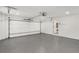 This garage features an epoxy floor and an automatic garage door at 151 Wilbur Ln, Lawrenceville, GA 30044