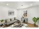 Bright living room featuring hardwood floors, contemporary furniture, and a serene ambiance at 151 Wilbur Ln, Lawrenceville, GA 30044