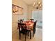 Dining room with tile floors and a chandelier at 1552 Viero Dr, Lawrenceville, GA 30044