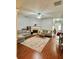 Spacious living room with hardwood floors, fireplace, and comfortable seating at 1552 Viero Dr, Lawrenceville, GA 30044