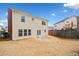 Backyard with patio and view of neighboring homes at 28 Dover Commons Dr, Tucker, GA 30084