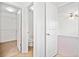 Hallway view with access to a closet, toilet, and bedroom at 28 Dover Commons Dr, Tucker, GA 30084