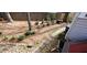 Landscaped backyard featuring a stepping stone path, trees, and other plantings at 2899 Greystone Cv, Chamblee, GA 30341