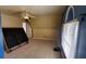 This bedroom has an arched window, ceiling fan and unique architectural details at 2899 Greystone Cv, Chamblee, GA 30341