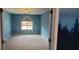 Bright bedroom with window and a glimpse of outdoor views from an inviting and relaxing space at 2899 Greystone Cv, Chamblee, GA 30341