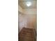 Walk-in closet features installed shelving, and updated flooring for optimal storage solutions at 2899 Greystone Cv, Chamblee, GA 30341