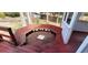 View of the home's wooden deck with built-in bench seating and stairs leading to the backyard at 2899 Greystone Cv, Chamblee, GA 30341