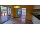 Open dining area featuring access to backyard through sliding door and seamlessly connected to kitchen at 2899 Greystone Cv, Chamblee, GA 30341