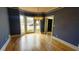 Dining room features beautiful hardwood floors and a modern chandelier at 2899 Greystone Cv, Chamblee, GA 30341