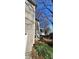 Exterior home detail showing the side of the home and landscaping at 2899 Greystone Cv, Chamblee, GA 30341
