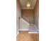 Inviting foyer featuring hardwood floors, a staircase, and a modern chandelier at 2899 Greystone Cv, Chamblee, GA 30341