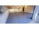 A clean garage with epoxy flooring and organized storage solutions for the discerning homeowner at 2899 Greystone Cv, Chamblee, GA 30341