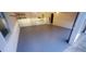 A clean garage with epoxy flooring and organized storage solutions for the discerning homeowner at 2899 Greystone Cv, Chamblee, GA 30341