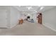 Open basement area with neutral carpet, exercise equipment, and ample space at 1194 Kendrick Ne Rd, Atlanta, GA 30319