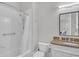 Bright bathroom featuring a shower/tub combination, neutral walls, and a granite countertop at 1194 Kendrick Ne Rd, Atlanta, GA 30319