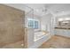 Spacious bathroom with a walk-in shower, a jacuzzi tub, and double sinks at 1194 Kendrick Ne Rd, Atlanta, GA 30319