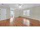 Spacious bedroom with hardwood floors, crown molding and natural light from large windows at 1194 Kendrick Ne Rd, Atlanta, GA 30319