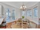 Cozy breakfast nook with chandelier lighting and natural light at 1194 Kendrick Ne Rd, Atlanta, GA 30319