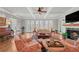 Elegant living room with coffered ceilings, fireplace, and French doors at 1194 Kendrick Ne Rd, Atlanta, GA 30319
