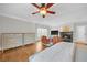 Large main bedroom with seating area, fireplace, wood floors, and natural light at 1194 Kendrick Ne Rd, Atlanta, GA 30319