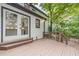 Backyard view of exterior, featuring a wood deck and the home's architecture at 2911 Bentwood Dr, Marietta, GA 30062
