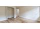 Empty bedroom featuring light wood flooring and an open closet providing storage solutions at 2911 Bentwood Dr, Marietta, GA 30062