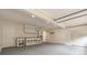 Spacious garage with white storage cabinets, great lighting, and coated floor creating an organized workspace at 2911 Bentwood Dr, Marietta, GA 30062
