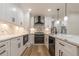 Modern kitchen with marble countertops, sleek cabinetry, and stainless steel appliances at 2911 Bentwood Dr, Marietta, GA 30062