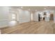 Open living space featuring hardwood floors, a view of the kitchen, and natural light at 2911 Bentwood Dr, Marietta, GA 30062