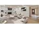 Bright living room with fireplace, built-in shelving, and wood flooring at 2911 Bentwood Dr, Marietta, GA 30062