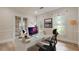 Bright office with glass desk, modern chair, and an abundance of light from two windows at 2911 Bentwood Dr, Marietta, GA 30062