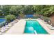 Aerial view of a community pool area with tennis courts and ample seating at 2911 Bentwood Dr, Marietta, GA 30062